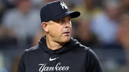 Aaron Boone #17 of the New York Yankees looks on against the Boston Red Sox at Yankee Stadium on September 13, 2024 in the Bronx borough of New York City. 
