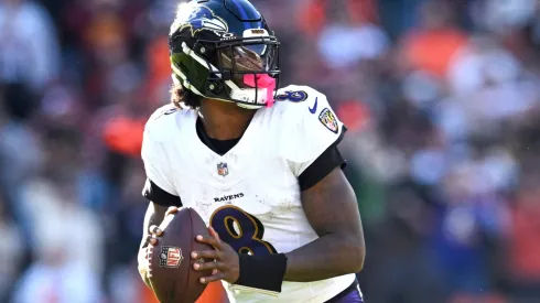 Lamar Jackson #8 of the Baltimore Ravens looks to pass in the fourth quarter of a game against the Cleveland Browns at Huntington Bank Field on October 27, 2024 in Cleveland, Ohio.
