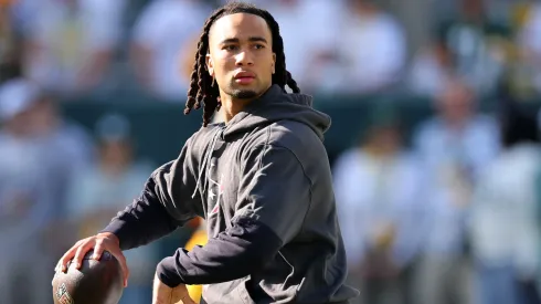 C.J. Stroud #7 of the Houston Texans participates in warmups prior to a game against the Green Bay Packers at Lambeau Field on October 20, 2024 in Green Bay, Wisconsin. The Packers defeated the Texans 24-22.
