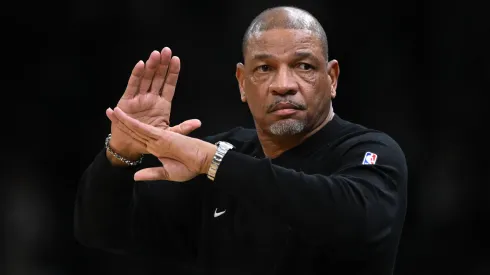 Doc Rivers of the Milwaukee Bucks signals during the first half of a game against the Boston Celtics at the TD Garden