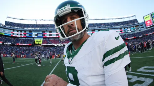 Aaron Rodgers #8 of the New York Jets walks off the field after the game against the New England Patriots at Gillette Stadium on October 27, 2024 in Foxborough, Massachusetts.
