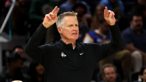 Golden State Warriors head coach Steve Kerr motions to his team during the first half of their preseason game against the Los Angeles Lakers at Chase Center on October 18, 2024 in San Francisco, California.
