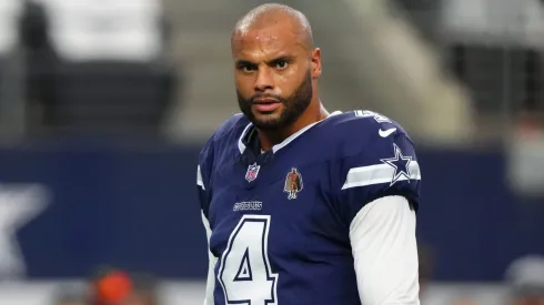 Dak Prescott #4 of the Dallas Cowboys looks on while warming up before a game against the Detroit Lions at AT&T Stadium on October 13, 2024 in Arlington, Texas.
