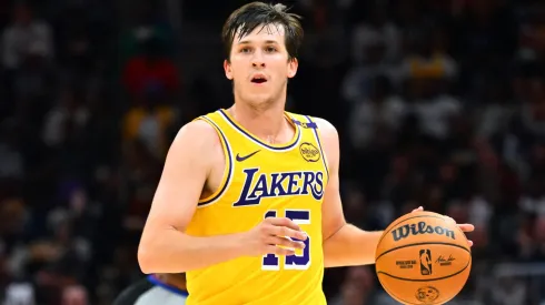 Austin Reaves #15 of the Los Angeles Lakers brings the ball up court during the second half against the Cleveland Cavaliers at Rocket Mortgage Fieldhouse on October 30, 2024 in Cleveland, Ohio. The Cavaliers defeated the Lakers 134-110.
