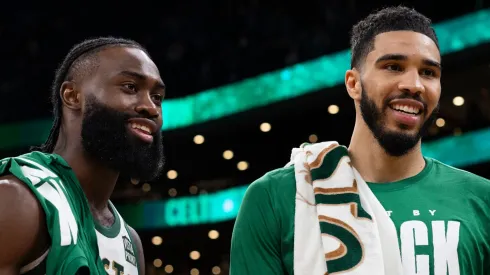 Jaylen Brown #7 of the Boston Celtics and Jayson Tatum #0 of the Boston Celtics react after a win over the Philadelphia 76ers at TD Garden on February 27, 2024 in Boston, Massachusetts. 
