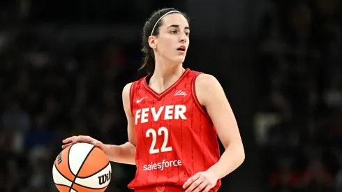 Caitlin Clark #22 of the Indiana Fever dribbles the ball in the first quarter of the game against the Minnesota Lynx
