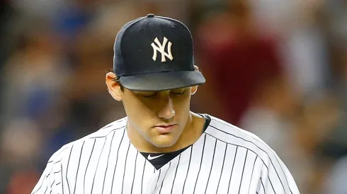 Archive: Nathan Eovaldi #30 of the New York Yankees reacts after the eighth inning against the Houston Astros at Yankee Stadium on August 24, 2015 in the Bronx borough of New York City.