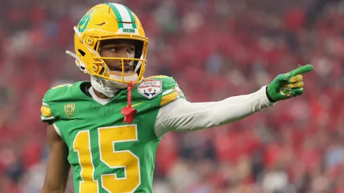 Wide receiver Tez Johnson #15 of the Oregon Ducks reacts to a first down against the Liberty Flames during the first half of the Fiesta Bowl at State Farm Stadium on January 01, 2024 in Glendale, Arizona.
