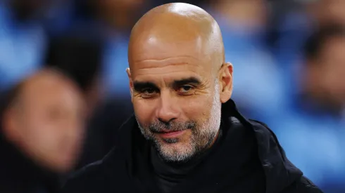 Pep Guardiola, Manager of Manchester City, looks on prior to the UEFA Champions League match between Manchester City and Rb Leipzig at Etihad Stadium on November 28, 2023.
