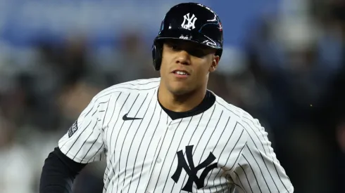 Juan Soto #22 of the New York Yankees rounds the bases after hitting a home run during the 3rd inning of Game One of the American League Championship Series against the Cleveland Guardians at Yankee Stadium on October 14, 2024 in New York City. 
