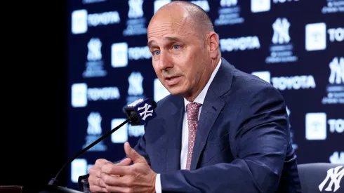 New York Yankees General Manager Brian Cashman speaks to the media prior to the start of the game against the Boston Red Sox at Yankee Stadium. 
