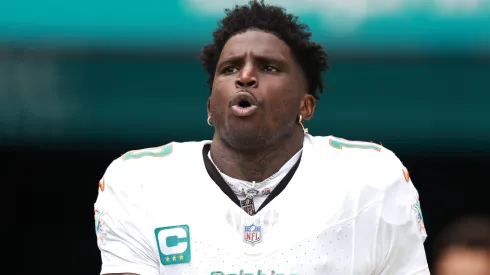 Tyreek Hill #10 of the Miami Dolphins runs on the field before playing the Arizona Cardinals at Hard Rock Stadium on October 27, 2024 in Miami Gardens, Florida.
