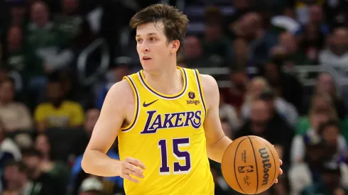 Austin Reaves #15 of the Los Angeles Lakers handles the ball during a game against the Milwaukee Bucks
