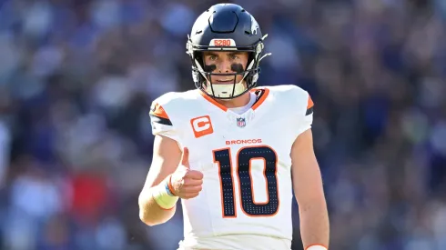 Bo Nix #10 of the Denver Broncos gives a thumbs up in the second quarter of a game against the Baltimore Ravens at M&T Bank Stadium on November 03, 2024 in Baltimore, Maryland.
