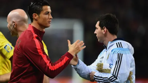 Cristiano Ronaldo of Portugal shakes hands with Lionel Messi of Argentina prior to the International Friendly between Argentina and Portugal at Old Trafford on November 18, 2014 in Manchester, England.
