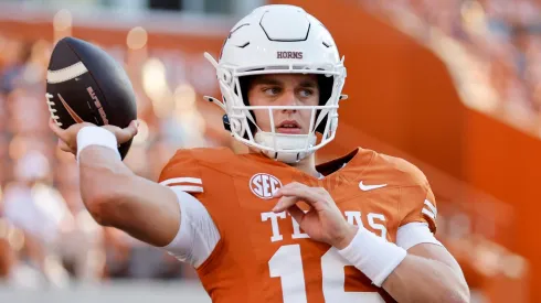 Arch Manning #16 of the Texas Longhorns warms up before the game against the Louisiana Monroe Warhawks at Darrell K Royal-Texas Memorial Stadium on September 21, 2024.