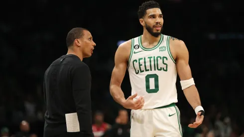 Jayson Tatum #0 of the Boston Celtics speaks with head coach Joe Mazzulla during game one of the Eastern Conference Finals against the Miami Heat at TD Garden on May 17, 2023 in Boston, Massachusetts. 
