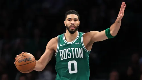 Jayson Tatum #0 of the Boston Celtics dribbles the ball against the Brooklyn Nets during the fourth quarter at the Barclays Center
