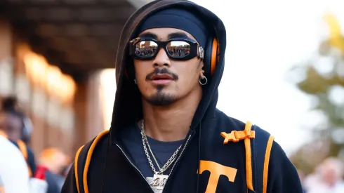 Nico Iamaleava #8 of the Tennessee Volunteers looks on during the Vol Walk prior to the game against the Kentucky Wildcats at Neyland Stadium on November 02, 2024 in Knoxville, Tennessee.
