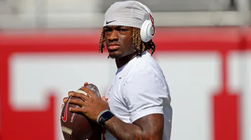 Quarterback Jalen Milroe #4 of the Alabama Crimson Tide warms up prior to a game against the Missouri Tigers at Bryant-Denny Stadium on October 26, 2024 in Tuscaloosa, Alabama.
