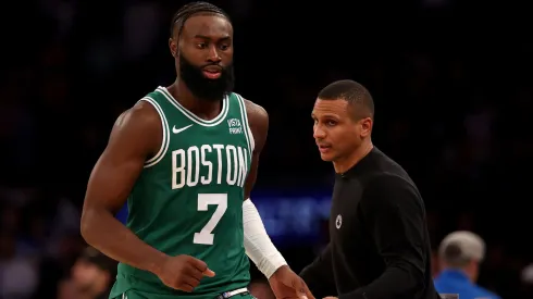 Jaylen Brown #7 of the Boston Celtics is greeted by head coach Joe Mazzulla as he heads to the bench at Madison Square Garden on October 25, 2023 in New York City. 
