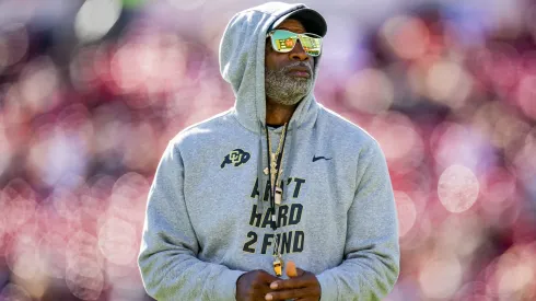 Head coach Deion Sanders of the Colorado Buffaloes walks across the field before the game against the Texas Tech Red Raiders at Jones AT&T Stadium on November 09, 2024 in Lubbock, Texas.