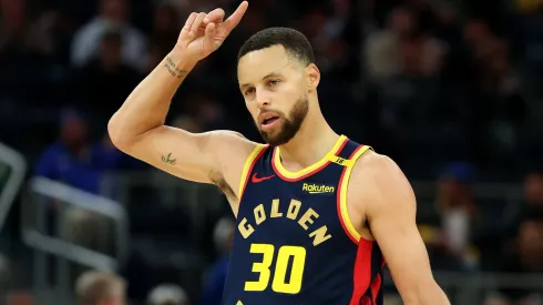 Stephen Curry #30 of the Golden State Warriors reacts after the Warriors scored a basket against the Atlanta Hawks in the second half at Chase Center on November 20, 2024 in San Francisco, California. 
