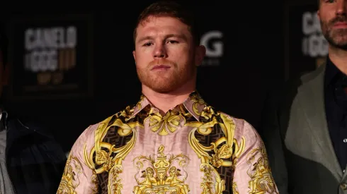Boxer Canelo Alvarez poses with his championship belts at the end of the press conference during the press tour for his fight against Gennady Golovkin in New York City.