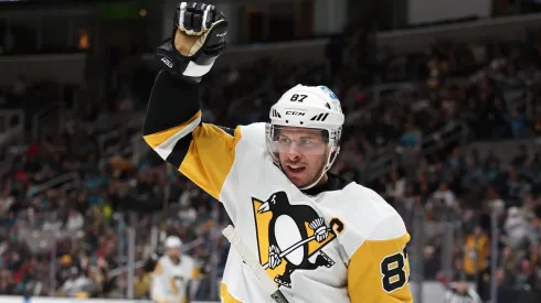 Sidney Crosby #87 of the Pittsburgh Penguins celebrates after Rickard Rakell #67 scored a goal against the San Jose Sharks in the first period at SAP Center on February 14, 2023. 
