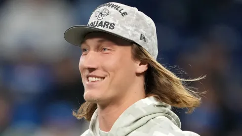 Trevor Lawrence #16 of the Jacksonville Jaguars looks on during warm ups before a game against the Detroit Lions at Ford Field on November 17, 2024 in Detroit, Michigan. 
