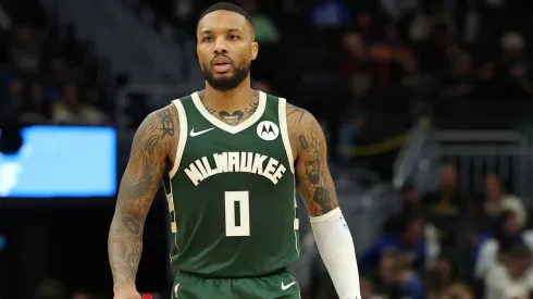 Damian Lillard #0 of the Milwaukee Bucks walks backcourt during a game against the Chicago Bulls at Fiserv Forum
