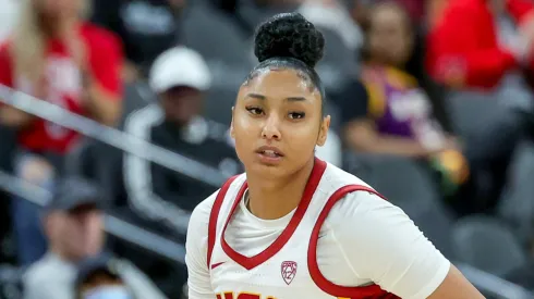 JuJu Watkins #12 of the USC Trojans brings the ball up the court against the Ohio State Buckeyes in the second half of their game during the Naismith Basketball Hall of Fame Series
