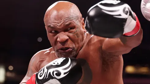 Mike Tyson in action against Jake Paul during LIVE On Netflix: Jake Paul vs. Mike Tyson at AT&T Stadium on November 15, 2024 in Arlington, Texas.
