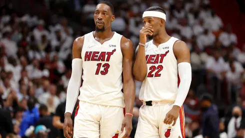 Bam Adebayo #13 and Jimmy Butler #22 of the Miami Heat talk during the second quarter against the Boston Celtics in Game Two of the 2022 NBA Playoffs Eastern Conference Finals at FTX Arena on May 19, 2022 in Miami, Florida.