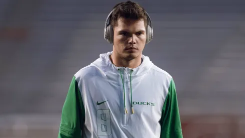 Wisconsin Badgers Vs. Oregon Ducks Oregon quarterback Dillon Gabriel 8 warms up at Camp Randall Stadium against the Wisconsin Badgers in Madison, Wisconsin, on November 16, 2024.