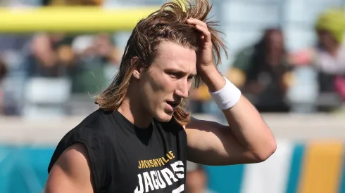 Trevor Lawrence #16 of the Jacksonville Jaguars looks on during warmups before playing the Green Bay Packers at EverBank Stadium on October 27, 2024 in Jacksonville, Florida.