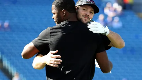 Amari Cooper #18 and Josh Allen #17 of the Buffalo Bills embrace prior to the game against the Tennessee Titans at Highmark Stadium on October 20, 2024 in Orchard Park, New York.
