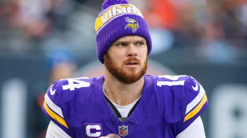 Minnesota Vikings quarterback 14 Sam Darnold warms up before the game against the Chicago Bears in Chicago, IL.
