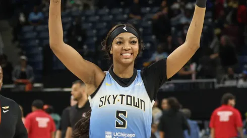 Angel Reese waves to the crowd after the game between the Chicago Sky and Los Angeles Sparks
