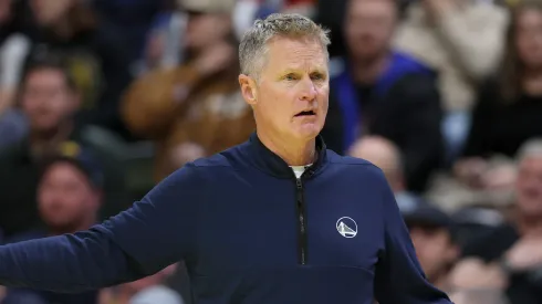 Head coach Steve Kerr of the Golden State Warriors questions a call as his team plays the Denver Nuggets in the first quarter of the Emirates NBA Cup at Ball Arena on December 3, 2024 in Denver, Colorado.