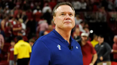 Head Coach Bill Self of the Kansas Jayhawks walks off the court after a game against the Arkansas Razorbacks at Bud Walton Arena on October 25, 2024.
