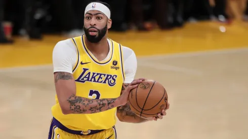 Anthony Davis #3 of the Los Angeles Lakers dribbles the ball against the Miami Heat.