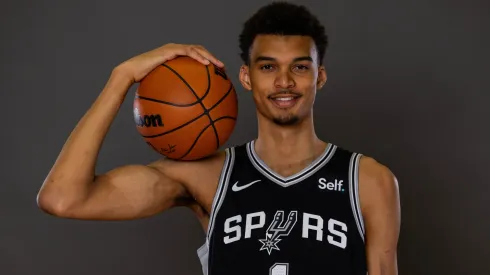 Victor Wembanyama #1 of the San Antonio Spurs poses for a portrait during the 2023 NBA rookie photo shoot at UNLV on July 12, 2023.