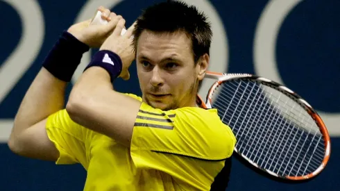 Robin Soderling of Sweden returns a shot during his singles match against Teimuraz Gabashvili.
