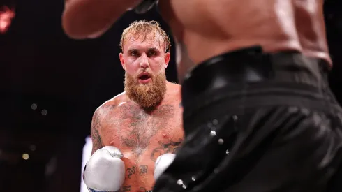 (L-R) Jake Paul and Mike Tyson fight during LIVE On Netflix: Jake Paul vs. Mike Tyson at AT&T Stadium on November 15, 2024 in Arlington, Texas.