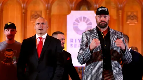 Oleksandr Usyk and Tyson Fury pose for a photo during the Usyk v Fury 2 Press Conference ahead of their IBO, WBC and WBO World Heavyweight titles' fight