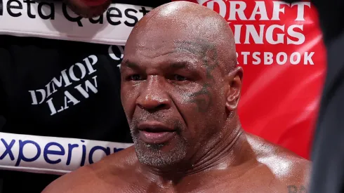 Mike Tyson sits in his corner between rounds against Jake Paul during LIVE On Netflix: Jake Paul vs. Mike Tyson at AT&T Stadium on November 15, 2024 in Arlington, Texas.