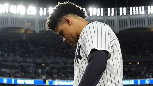 Juan Soto #22 of the New York Yankees walks to the dugout prior to playing the Los Angeles Dodgers during Game Three of the 2024 World Series at Yankee Stadium on October 28, 2024 in the Bronx borough of New York City.