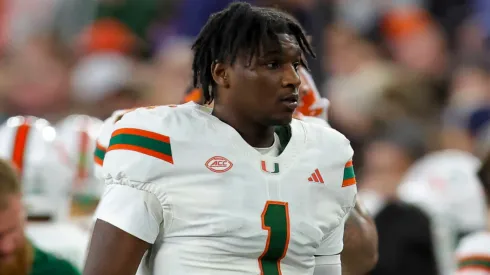 Miami Hurricanes quarterback CAM WARD (1) discusses the game on the sideline during the ACC conference football game between Syracuse and Miami played at the JMA Wireless Dome on the campus of Syracuse University.
