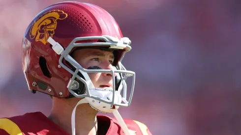 Southern California quarterback MILLER MOSS (7) warms up by the sideline while waiting for play to resume during a NCAA, College League, USA football game between Wisconsin and Southern California at the Los Angeles Memorial Coliseum in Los Angeles, California.
